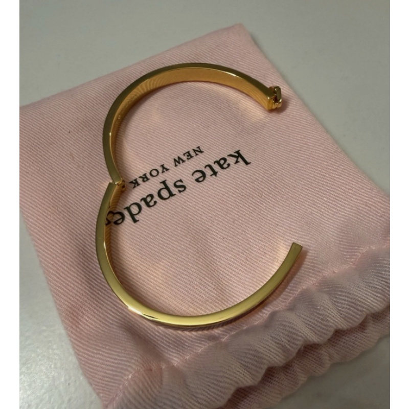 Kate Spade New York Gold Black Metal Bangle Bracelet with Heart Accent