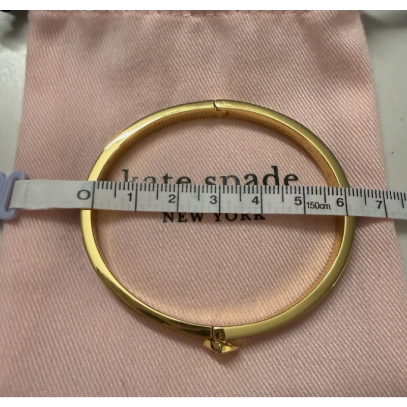 Kate Spade New York Gold Black Metal Bangle Bracelet with Heart Accent